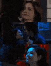 a man and a woman are hugging each other in a room .