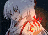 a girl with long white hair and red eyes holds a fire in her hand