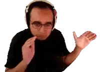 a man wearing headphones and glasses is making a gesture with his hands