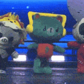 a stuffed animal with the letter p on its chest