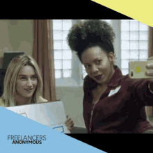 two women are taking a selfie with the words freelancers anonymous behind them