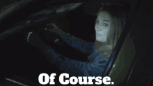 a woman is sitting in a car with the words of course written below her