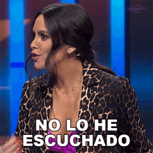 a woman in a leopard print jacket says no lo he escuchado in spanish
