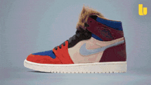 a pair of black and orange nike air jordan shoes