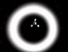 a white circle in the middle of a black background with a molecule in the middle .