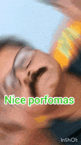 a blurry picture of a person with the words nice porfomas written on it