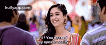 a woman is smiling and saying hi you opened my eyes to reality .