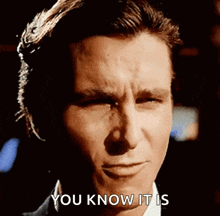 a close up of a man 's face with a caption that says `` you know it is '' .