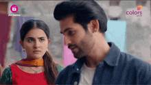 a man and a woman are looking at each other in a jiocinema ad