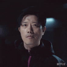 a close up of a man 's face with netflix written on the bottom