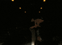 a man in a black jacket is standing in a dark room with kepler written on the bottom