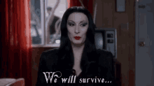 We Will Survive - The Addams Family GIF - Addams Family Morticia Addams The Addams Family GIFs
