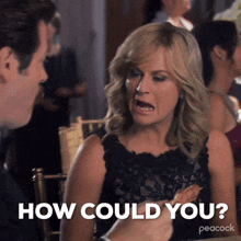a woman is sitting at a table with a man and asking how could you