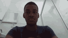 a man taking a selfie in front of a mirror