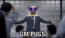 a man in a suit with a pug on his head and the words gm pugs on the bottom right