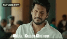 a man with a beard wearing a white shirt is making a funny face and saying abba super chance .
