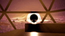 a computer generated image of a black hole in the middle of space