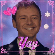 a picture of a smiling man with the word yay written on it