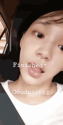 a close up of a woman 's face with the words finished and goodnight written below her