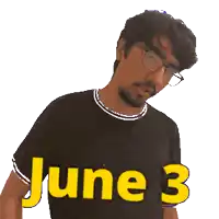 a man wearing glasses and a black shirt with the words june 3 on it