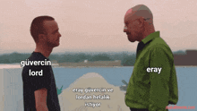 two men are standing next to each other and one of them has the word lord written on his shirt