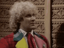 Sixth Doctor Sigh Of Relief GIF - Sixth Doctor Sigh Of Relief Happiness GIFs