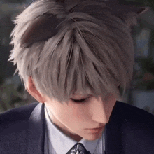 a close up of a person wearing a suit and tie with cat ears on their head