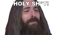 a man with long hair and a beard is saying holy sh * t