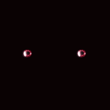 a poster for fear of death with glowing eyes in the dark