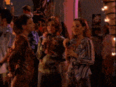 three women standing next to each other with the words " i 'm expecting a big karmic reward any second now " above them