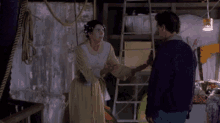 a man and woman shaking hands with the words i 've invented my own gesture below them