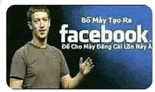 a man is standing in front of a sign that says facebook