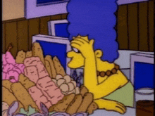 a cartoon of marge simpson sitting at a table