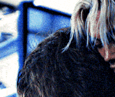a close up of a person 's hair with a blurred background