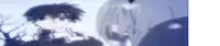 a boy and a girl are standing next to each other in the snow looking at each other .