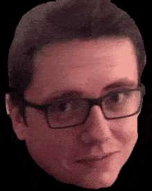 a close up of a man wearing glasses with a black background