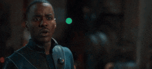 a man in a black jacket is talking about 400,000 years ago what was the planet called