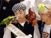 a group of young men are celebrating a birthday .