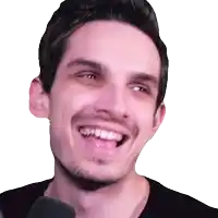 a man with a beard and mustache is smiling