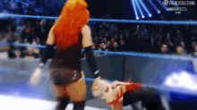 a woman in a wrestling ring with the nextblgthing written on the bottom
