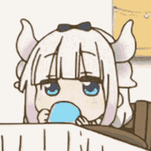 a cartoon girl with horns is drinking from a blue cup .