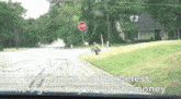 a stop sign on the side of a road with the words he 's broke