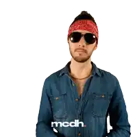 a man wearing sunglasses and a bandana with the word mcdh on the bottom right