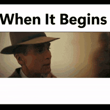 a man wearing a hat with the words " when it begins " above him