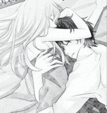 a black and white drawing of a man and woman hugging each other on a bed .