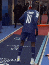a soccer player with the number 10 on their back