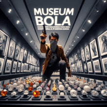 a man holding a gun in a museum with the words museum bola on it