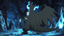 a pokemon is standing in a cave with a blue light coming out of its mouth .