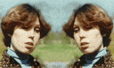 a woman 's face is reflected in a mirror while wearing a turtleneck