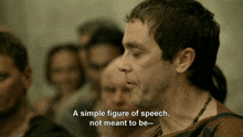 a man says " a simple figure of speech " in front of a crowd